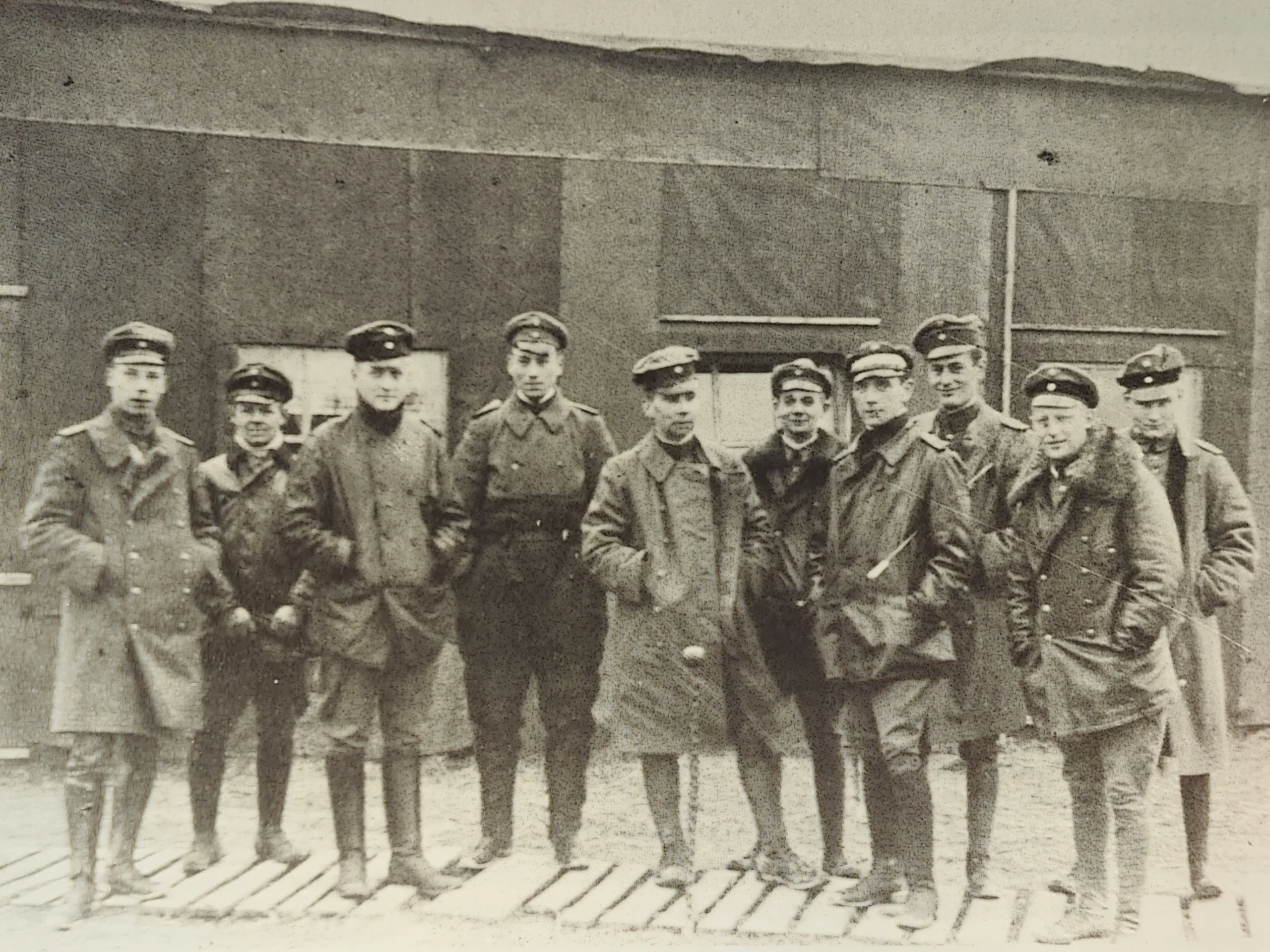 a group of men standing next to each other